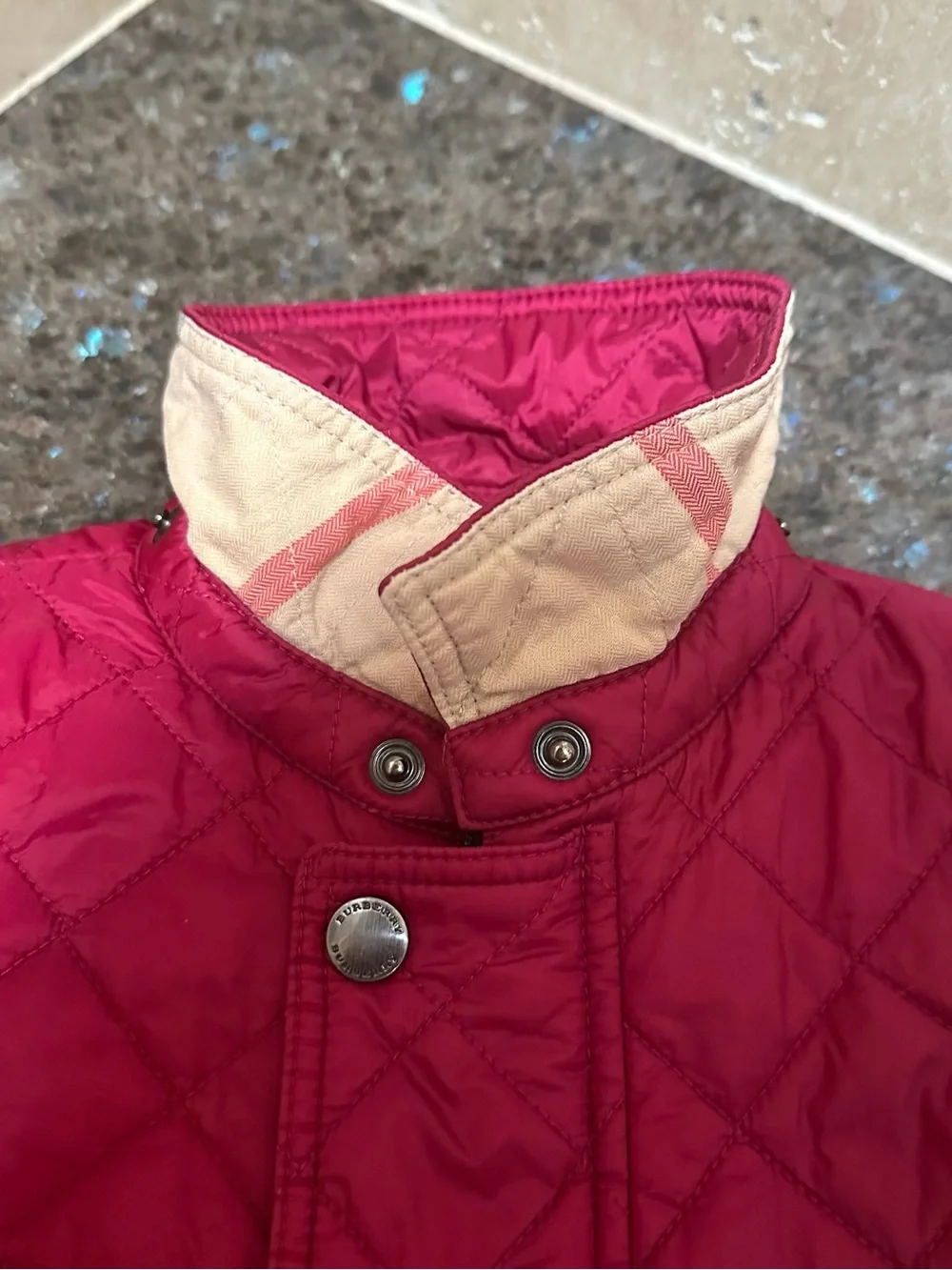 Burberry kid’s magenta signature quilted jacket